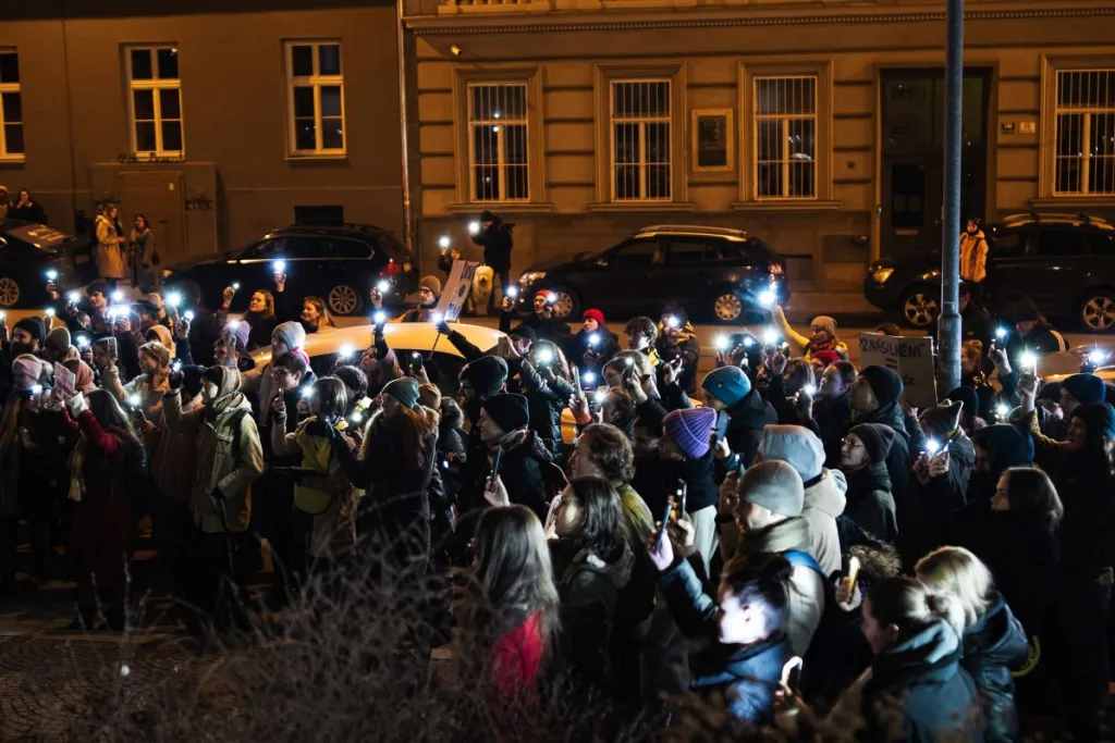 The protesters shone mobile phone torches at the courthouse before proceeding to march through the city centre. Credit: Andrea Spak.